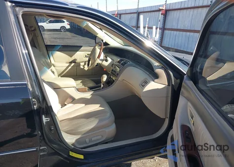 2004 Toyota Avalon Xls z USA, uszkodzony, nr VIN 4T1BF28B14U389511